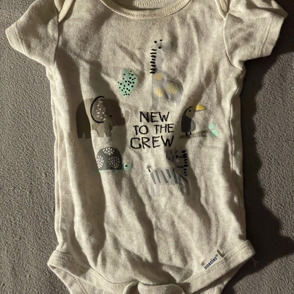 Ivory Animal Print Baby Onesie